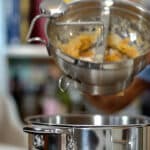 passing apple through a food mill