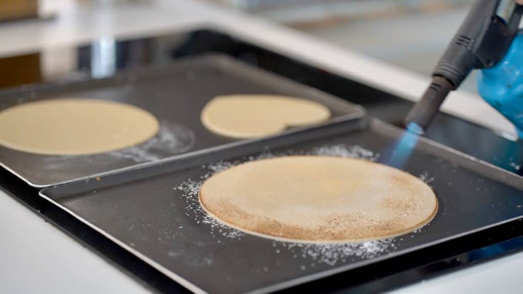 blowtorching marzipan disc