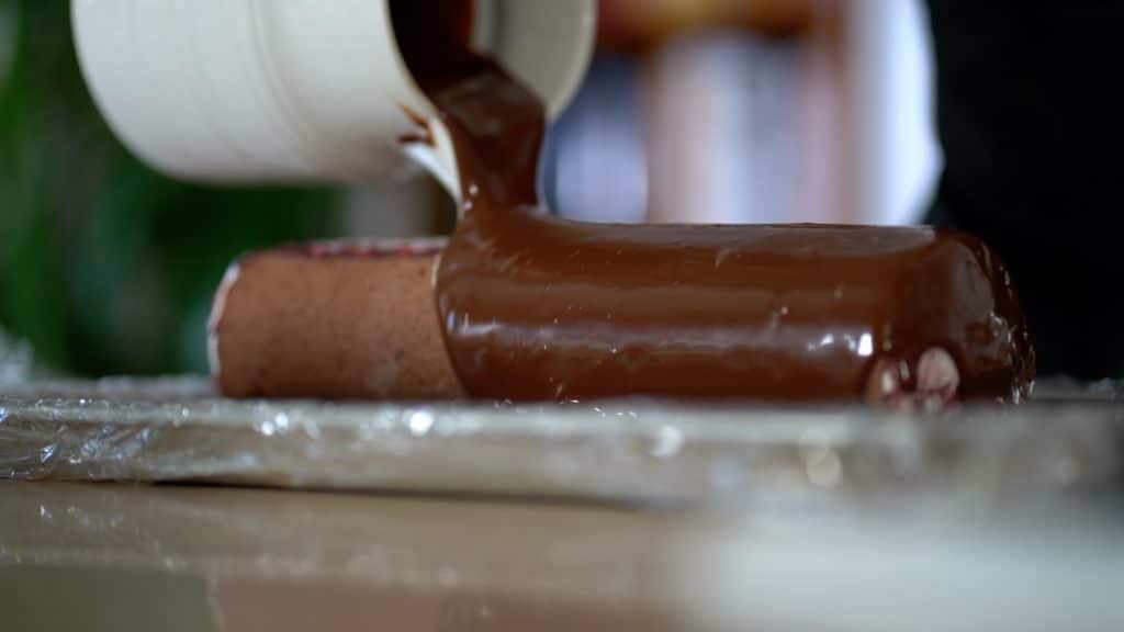 glazing chocolate cake roll