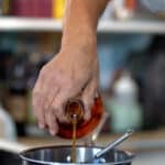 adding cognac to chestnut syrup