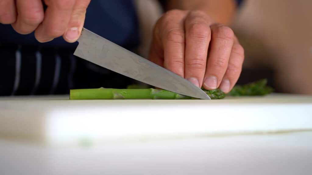 cutting blanched asparagus
