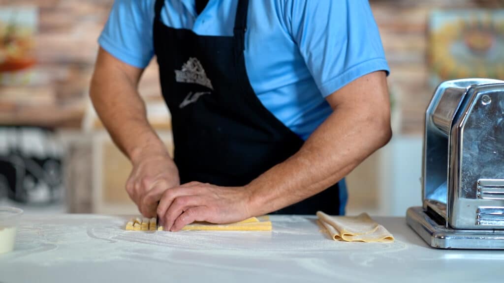 cutting fresh tagliatelle