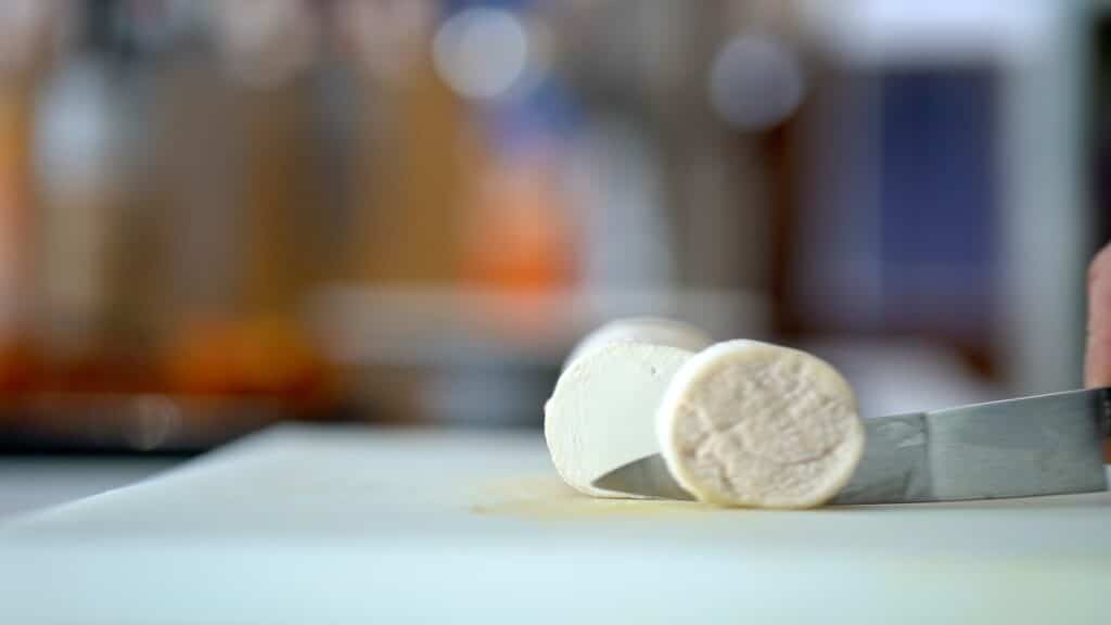 slicing goat cheese log