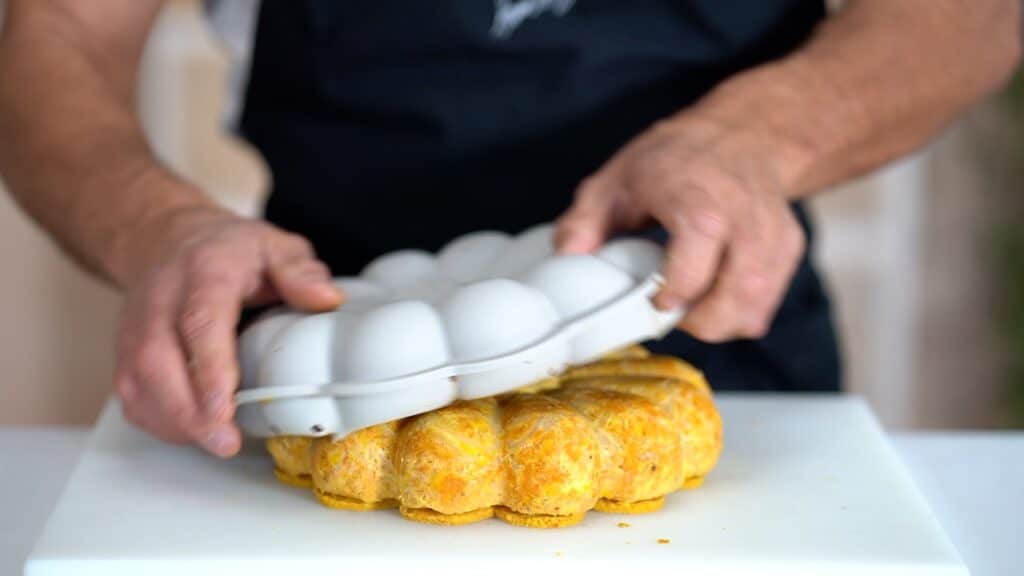 unmolding pumpkin gratin from silicone mold