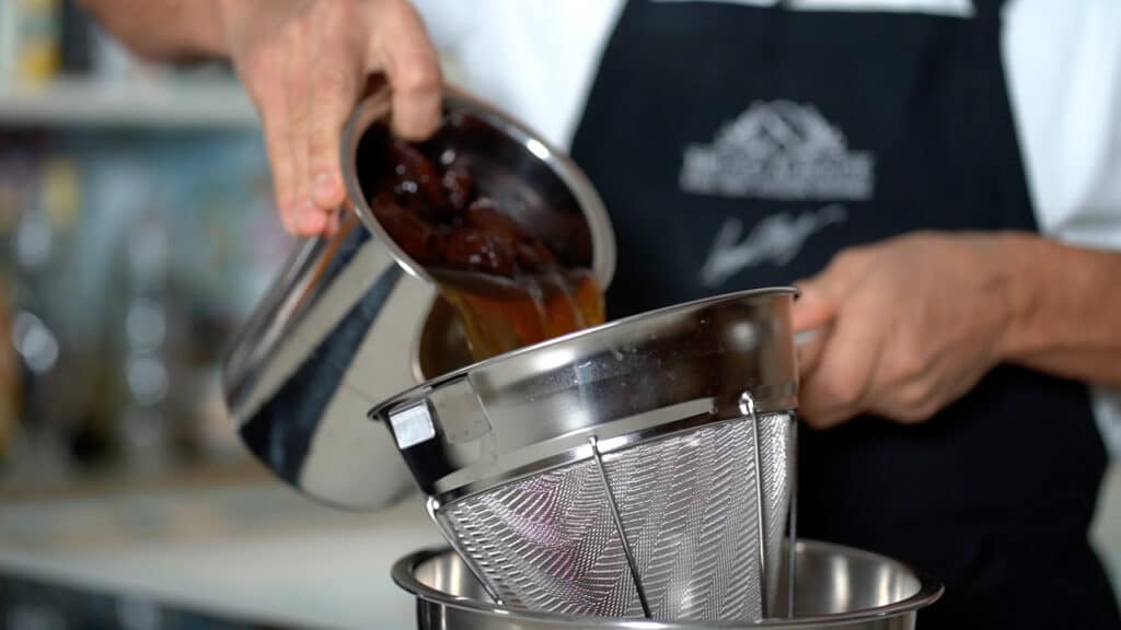 draining soaked prunes