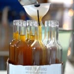 filling up walnut spirit bottles