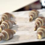 6 frozen bicolor croissants on baking tray