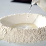 kneading pizza dough