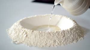 kneading pizza dough