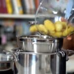 passing potatoes through food mill