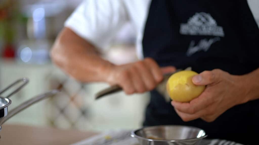 peeling cooked potatoes