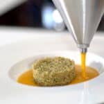 quinoa served with pumpkin velouté