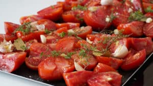 halved tomatoes on baking trays