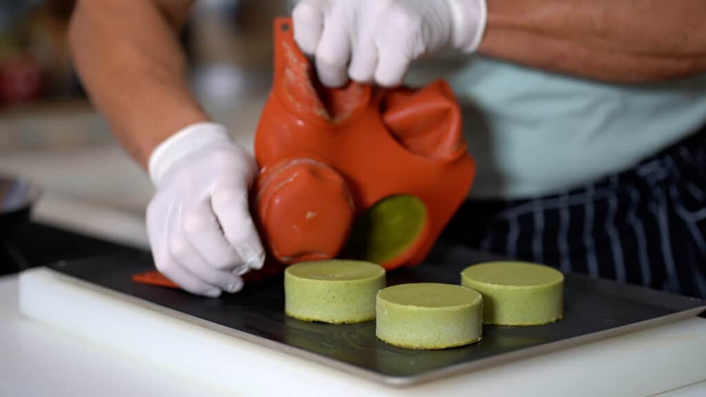 un-molding individual asparagus flan