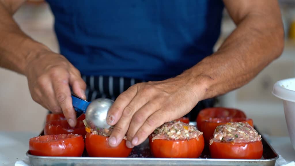 stuffing tomatoes