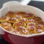 twice baked potatoes in shallow dish