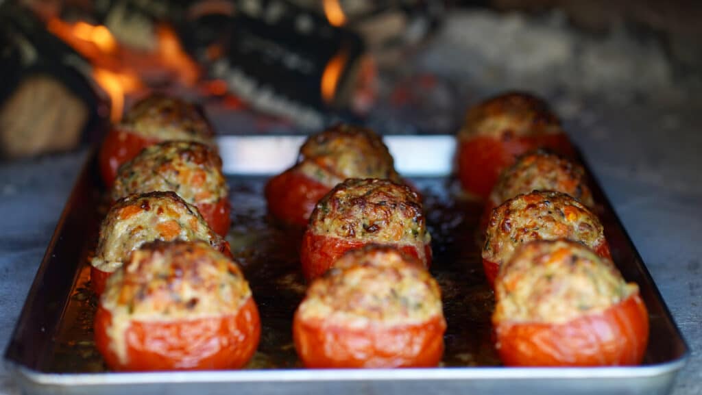 stuffed tomatoes cooked in wood-fired oven